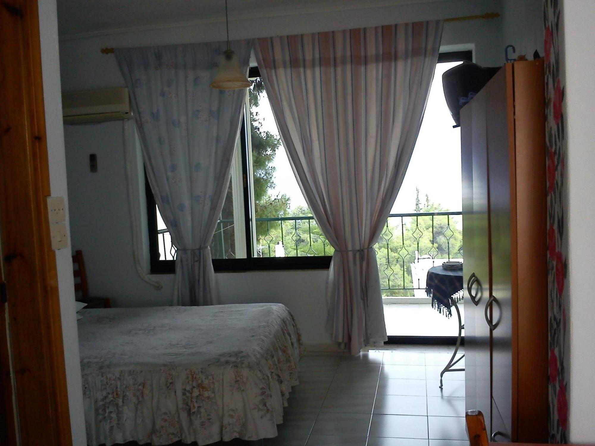 Mina Apartments Poros Town Habitación foto
